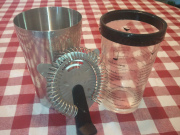 A Boston shaker and a Hawthorne strainer.